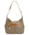 Giani Bernini's signature jacquard fabric adorns this gracefully shaped bag for a look of timeless sophistication.