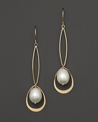 Gleaming 14K yellow gold frames freshwater pearls on these elegant drop earrings.