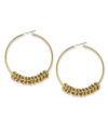 A bevy of discs shimmy and shake with glittering crystal accents on these hoop earrings from Alfani. Crafted in 12k gold-plated mixed metal. Approximate diameter: 2 inches.