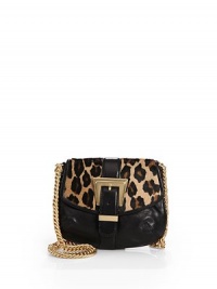 THE LOOKGoldtone shoulder chainLeopard printed calf hair flapBuckle strap front detailSnap flap closureOne inside open pocketInside logo tagTHE FITShoulder chain, 20 drop8½W X 7H X 1½DTHE MATERIALCalf hairLeatherFully linedORIGINImported