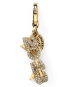 Cheers to the new year! Keep party memories close at hand with this whimsical charm from Juicy Couture.