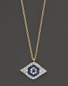 Diamonds and blue sapphires in 14K. yellow gold from a dazzling evil eye necklace. By Meira T.