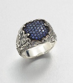 A cluster of pave sapphires set in finely detailed sterling silver.Sterling silverSapphiresAbout .75 diameterImported