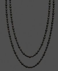 Polish and shine for miles! This long, onyx (5-6 mm and 7-8 mm) strand necklace adds elegance in layers and unique contrast to any look. Approximate length: 64 inches.