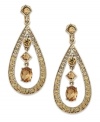 Make an entrance in these charming drops by Charter Club. The teardrop shaped is accented with topaz tone glass accents, while three stones drop at the center. Crafted in gold tone mixed metal. Approximate drop: 1-3/4 inches.