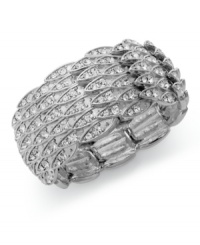 An elegant design flaunts pave glass accents on this cuff bracelet from Alfani. Crafted in imitation rhodium tone mixed metal. Approximate length: 7-1/2 inches. Stretches to fit wrist.