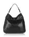 Tory Burch creates a luxe leather hobo that truly stands the test of time.