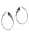 Chic hoops with a crystallized design. These earrings by Jessica Simpson feature clear and jet crystals set in a sleek silvertone mixed metal setting. Approximate drop: 2-1/2 inches.