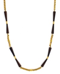 An earthy-cool blend. Vince Camuto combines wooden beads with an intricate box chain in gold tone mixed metal on this long, luxurious style. Approximate length: 36 inches.