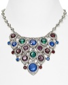 A true statement piece: this bold bib necklace from ABS by Allen Schwartz is an instant outfit-maker, crafted of plated metal with a cascade of colored gemstones.