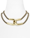 Giles & Brothers make chic work of the industrial-inspired jewelry trend with this brass oxide collar necklace. With polished links and a bold look, it encapsulates downtown cool.