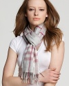 A stylish check printed scarf that is so soft, you won't want to take it off.