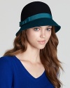 Take the colorblocking trend to the top with August Accessories' cloche, featuring a contrast brim and ribbon detail.