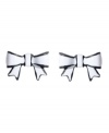 Chic bows in contrasting colors. Betsey Johnson earrings feature flirty bows in black and white enamel. Set in mixed metal. Approximate diameter: 1 inch.