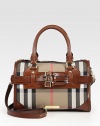 Iconic Burberry check lends a signature touch to this roomy cotton satchel, finished with rich leather trim and buckles.Leather double top handles, 5 drop Leather detachable adjustable shoulder strap, 21-22 drop Top zip closure Protective metal feet One inside zip pocket Two inside open pockets Cotton lining 12W X 9½H X 6½D Made in Italy