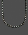 Channel the look of a Tahitian goddess. Belle de Mer's smooth strand of black cultured Tahitian pearls (8-9 mm) completes a look of rich opulence. Set in 14k gold. Approximate length: 18 inches.