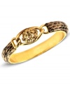 Beastly beauty. Anne Klein's bangle bracelet combines snakeskin leather with a lion's head accent for ferocious fashion. Crafted in gold tone mixed metal. Approximate diameter: 2-1/2 inches