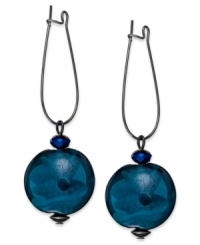 Drops of cool blue from Style&co. These drop earrings feature teal glass stones dangling from a hematite tone wire. Crafted in hematite tone mixed metal. Approximate drop: 1-1/4 inches.