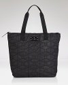 Bold style can be a beautiful thing - just check out this textured tote bag from kate spade new york which flaunts a day-right shape and endless versatility.