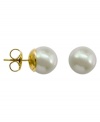 From the island of Mallorca, Spain, these stud earrings feature always-classic white round organic man-made pearls (8 mm) with 14k gold posts.