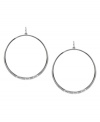 Geometric glam, by Vince Camuto. These classic hoop earrings have been upgraded with rectangular stud detail at the bottom. Crafted in silver tone mixed metal. Approximate drop: 2-1/2 inches.