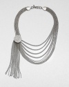 A sleek and unique design featuring delicate link chains in a multi-row style accented with a pavé stone embellishment and tassel. SilvertoneGlass stonesLength, about 20Tassel length, about 6Lobster clasp closureImported 