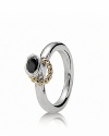 A 14K gold 'halo' adds contrast and movement to PANDORA's black zirconia solitaire ring.