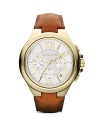 A pristine, gold plated bezel tops a classic and elegant Michael Kors watch set on a handsome chocolate leather strap.