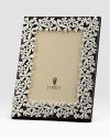 White Swarovski crystals shimmer on the platinum tone floral garland that surrounds this rich leather design.Holds 5 X 7 photoClassic beveled glassStretched leather backingGift boxedImported