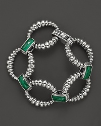 Malachite doubles connect fluted sterling silver loops on this link bracelet from Lagos.