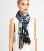 A hand-printed, colorful abstract print adorns a woven scarf.Viscose40 X 74Hand washImported