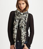 A striking ikat print refreshes this lengthy, lightweight scarf. ViscoseAbout 60 X 60Dry cleanImported