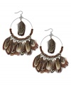 Gypsy inspired. Ali Khan's wood and glass bead earrings (4 mm) combine with brown feathers for an ultra-trendy effect. Set in silver tone mixed metal. Approximate drop: 3-3/4 inches. Approximate diameter: 2 inches.