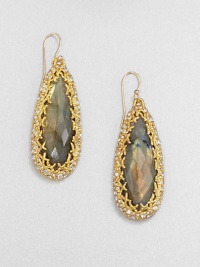 From the Elements Siyabona Collection. The tantalizing iridescence of faceted labradorite teardrops, elegantly framed by a spikey golden setting accented with Swarovski crystals.LabradoriteCrystalGoldtoneDrop, about 2.25Ear wireMade in USA