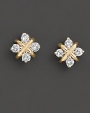 With four diamonds in a 14 Kt. yellow gold setting, these stud earrings brings a classic sense of style to your look.