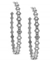 Fashion with an edge. Vince Camuto's open hoop earrings are crafted from silver-tone mixed metal with glass crystal accents on a jagged silhouette. The earrings feature a post with friction back closure. Approximate drop: 2 inches.