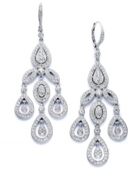 Let sparkle do the talking. Eliot Danori's stunning statement earrings speak volumes with stunning crystal accents and a rhodium-plated silver tone mixed metal setting. Approximate drop: 1-1/2 inches.