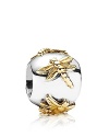 Graceful dragonflies flutter about on PANDORA's sterling sterling charm.