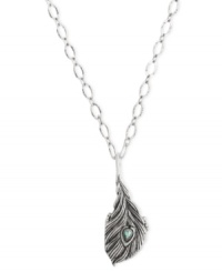 Float through life with this feather locket necklace from Lucky Brand. Crafted from silver-tone mixed metal with a semi-precious turquoise accent in the center, this whimsical piece will take you to new heights. Item comes packaged in a signature Lucky Brand Box. Approximate length: 32 inches + 2-inch extender. Approximate drop: 2-3/8 inches.