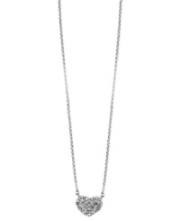 Show your love for all that sparkle. This darling heart pendant necklace from Anne Klein glistens with pave accents. Crafted in silver tone mixed metal. Approximate length: 16 inches + 2-inch extender. Approximate drop: 1/2 inch.