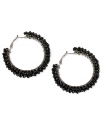 This time with feeling. Black beads give texture to this pair of hoop earrings from Haskell. Crafted from hematite-tone mixed metal.  Approximate diameter: 2 inches.