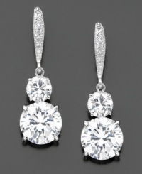 Feel red carpet ready wearing these glamorous two round-cut cubic zirconia (6 ct. t.w) drop earrings with pavé crystals at the top. Rhodium plated. Drop measures 1-1/4 inch.