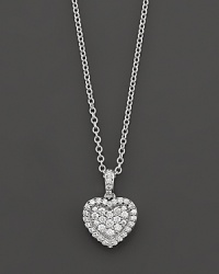 A lovely pendant with pave-set diamonds in 14 Kt. white gold.