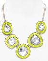 Electric shades are a bright way to accent every look, and this crystal necklace from Aqua is wholly head-turning. We love the piece's chunky look - rock it against a neutral palette for a color-pop contrast.