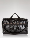 LeSportsac gives its signature, super spacious travel bag a jet set makeover with a glossy coating and gleaming trims.