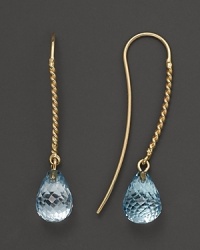 Faceted blue topaz briolettes add rich sparkle to 14K yellow gold. By Nancy B.