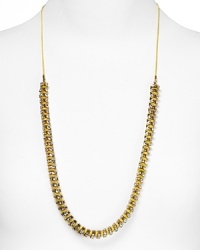 kate spade new york shoots from the hip with this woven crystal and string necklace. Equal parts edgy and understated, it's an instant impact piece.