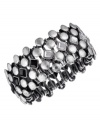 This delicious diamond-patterned cuff bracelet will bring out your inner diva. From the Jessica Simpson collection, this cuff features jet and smoke-colored crystal accents set in silvertone mixed metal. Approximate diameter: 2 inch.