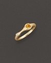 A faceted orange citrine and a brilliant diamond add bright color to gleaming 18K yellow gold. By Carelle.