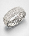 Shell Pattern Sparkle BangleThe lacy shell pattern of this shimmering pavé design is as feminine as it is fabulous.CrystalRhodium platingDiameter, about 2.25Hinged with tongue-and-groove claspImported